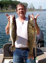 Al with a 4 & 7+ Walleye from Bull Shoals